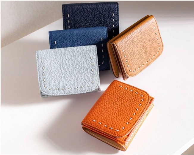 手縫いの革紐ステッチが特徴的なナガタニの三つ折り財布5色